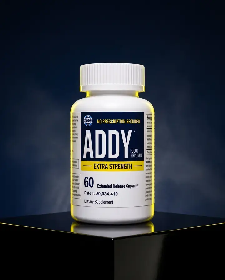 The ADDY Extra Strength 60-count bottle on a black plinth in blue haze, a yellow rim light along its edge.